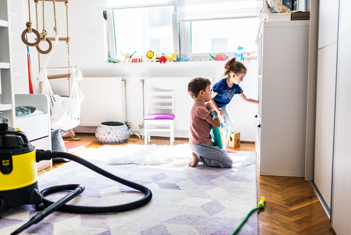 Children cleaning their room